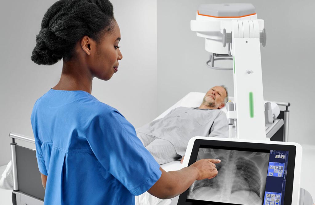 Image: Radiographer using the MOBILETT Elara Max mobile X- ray machine (Photo courtesy of Siemens Healthineers).